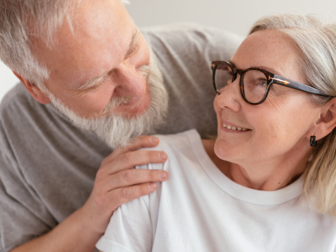 image of a man and a woman smiling